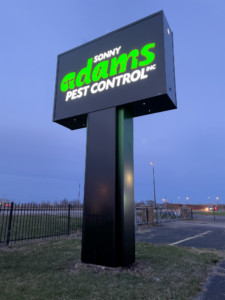 Sonny Adams Pest Control Night - Illuminated Pylon - Night